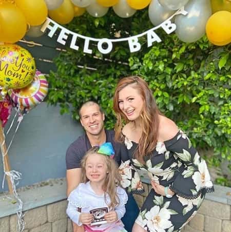 Rachel Reilly with her husband Brendon Villegas and daughter Adora excited on the pregnancy news